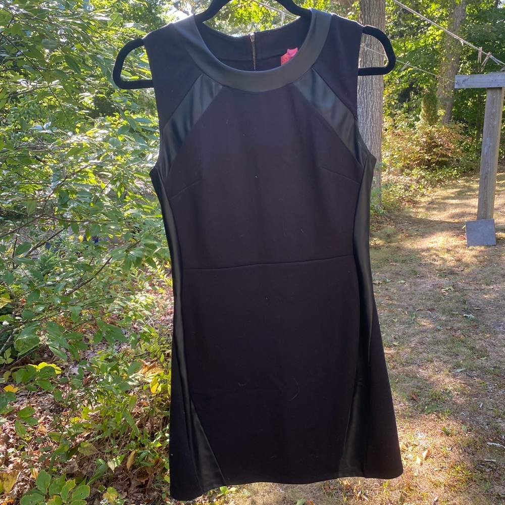 Black dress with fake leather paneling